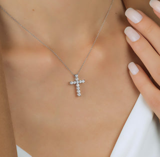 Image of a Lady Wearing a Cross Necklace