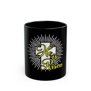 He Is Risen Signature Collection 11 oz black Christian mug with white and yellow radiant resurrection design