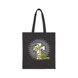 He Is Risen Signature Collection black Christian canvas tote bag with white and yellow radiant resurrection design