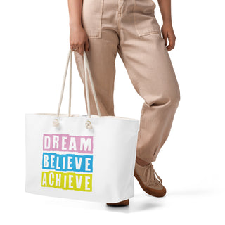 Image of Person holding Dream Believe Achieve Oversized Weekender Bag