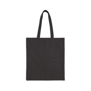 A plain black canvas tote bag with two long shoulder straps, shown flat against a solid white background.